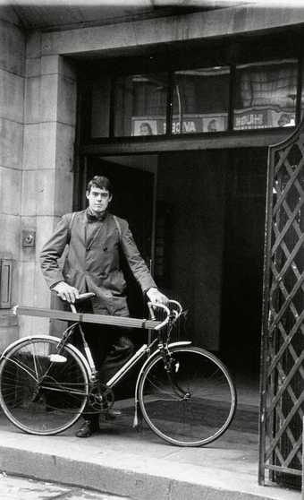 Richard Long outside St Martin's School of Art, London, at the start of 'Cycling Sculpture, 1- 3' December 1967