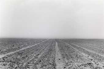 Santu Mofokeng, Dust Storms at Noon on the R34 Between Welkom and Hennenman, Free State I, 2007, printed 2011, from the series Climate Change, 2007, gelatin silver print on paper, 64 x 98 cm