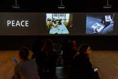 Visitors in the Performer and Participant display at Tate Modern