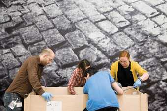 art handlers in the gallery